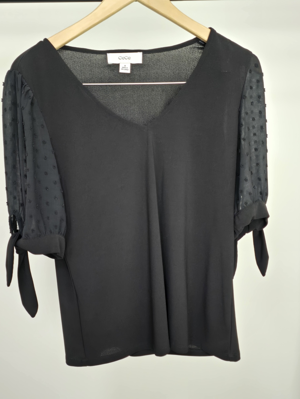 CeCe Black V-Neck Knit Top with Swiss Dot Tie Sleeves